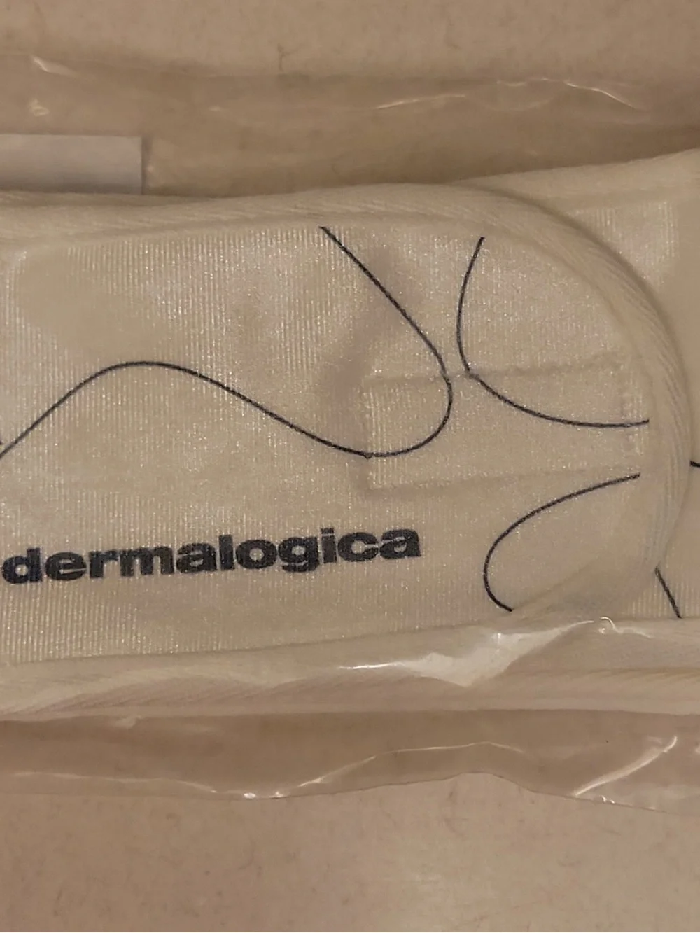 Dermalogica White Skincare Headband with Navy Accents